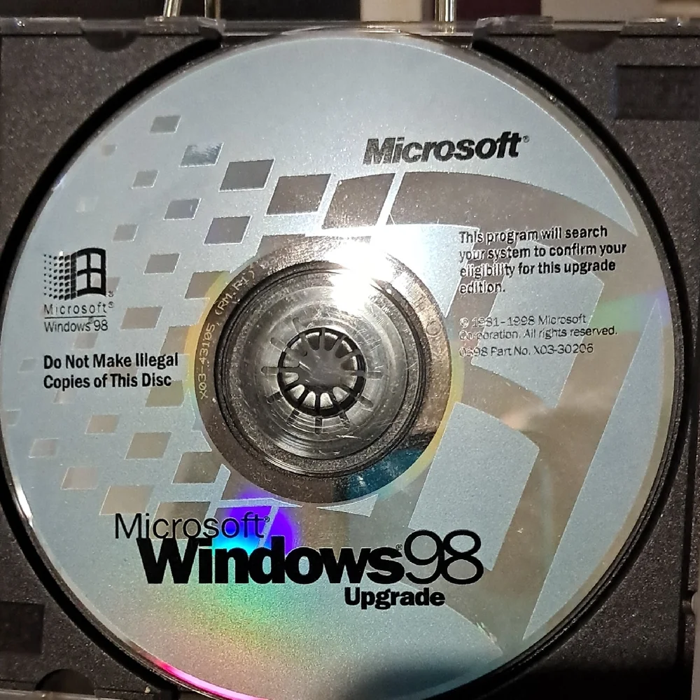 Microsoft Windows 98 CD Collection with Black and Silver Accents